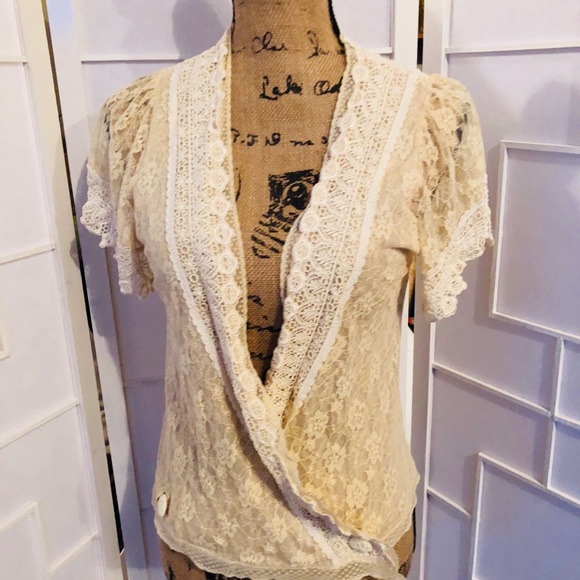 Super feminine lace wrap shirt. Hangs really well. - Picture 2 of 8